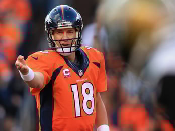 DENVER, CO - OCTOBER 13:  Quarterback Peyton Manning #18 of the Denver Broncos directs the offense against the Jacksonville Jaguars at Sports Authority Field at Mile High on October 13, 2013 in Denver, Colorado. The Broncos defeated the Jaguars 35-19.  (Photo by Doug Pensinger/Getty Images)